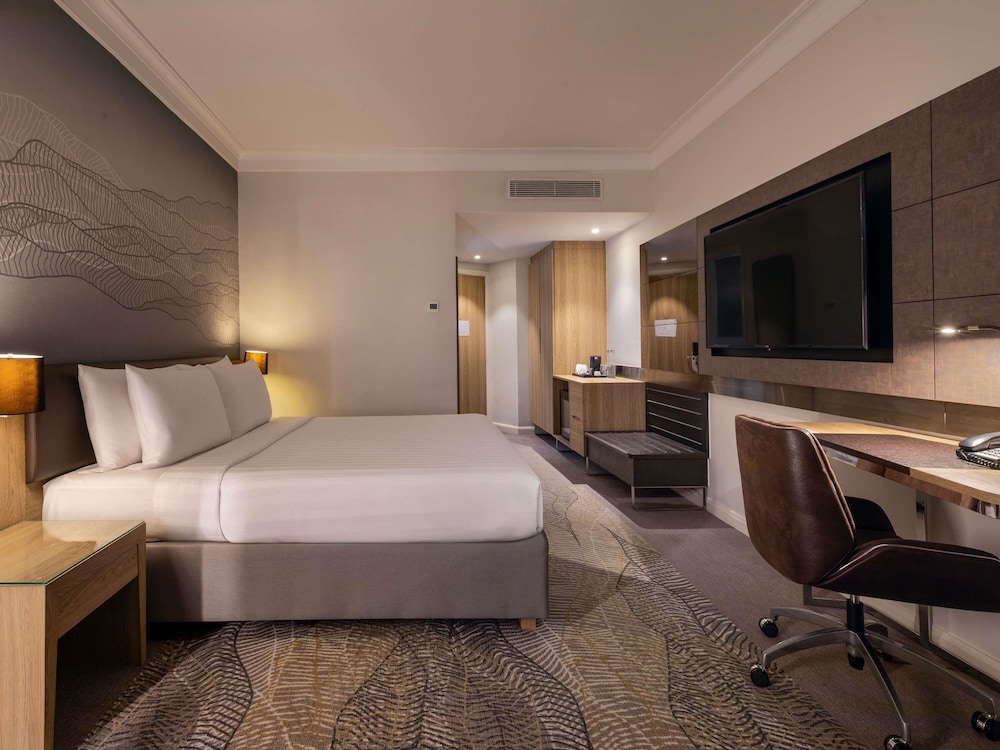 Habitación Deluxe con 1 cama king del hotel Novotel Kuala Lumpur City Centre. Foto 1