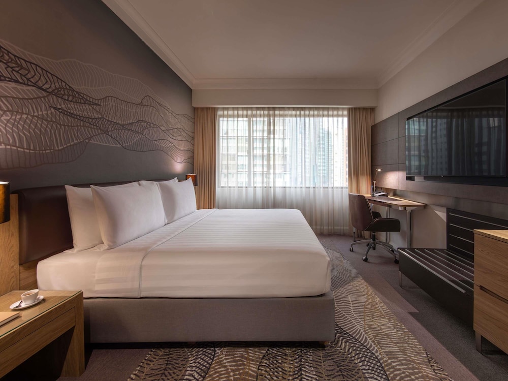 Habitación Deluxe con 1 cama king del hotel Novotel Kuala Lumpur City Centre. Foto 4
