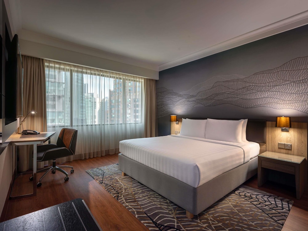 Suite Junior con 1 cama king del hotel Novotel Kuala Lumpur City Centre. Foto 3