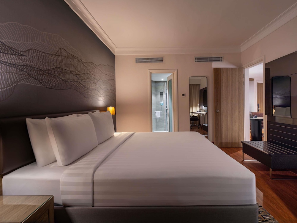 Suite Junior con 1 cama king del hotel Novotel Kuala Lumpur City Centre. Foto 4