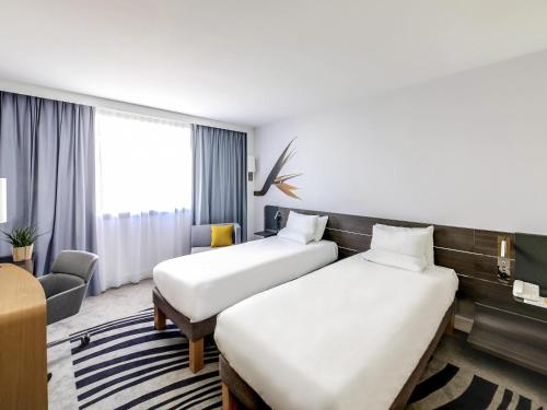 Habitación Twin Clásica - 2 camas individuales del hotel Novotel Paris Centre Gare Montparnasse