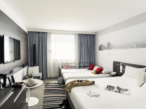 Habitación Executive Queen con sofá cama del hotel Novotel Paris Centre Gare Montparnasse