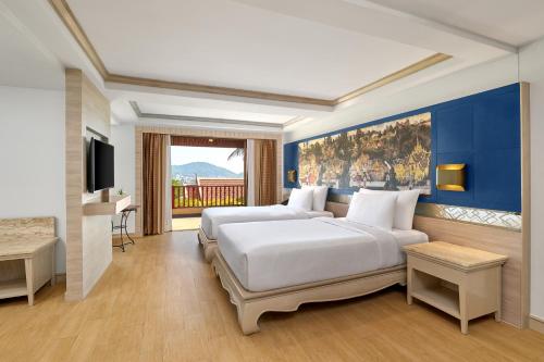 Habitación Deluxe con Vistas al Jardín, 2 Camas Individuales del hotel Novotel Phuket Resort - Sha Plus