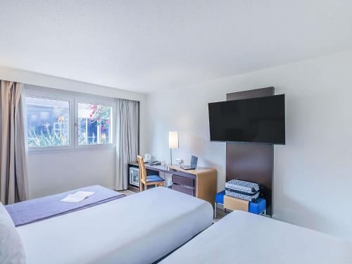 Habitación Doble adaptada para personas de movilidad reducida - 2 camas del hotel Novotel Setubal. Foto 1