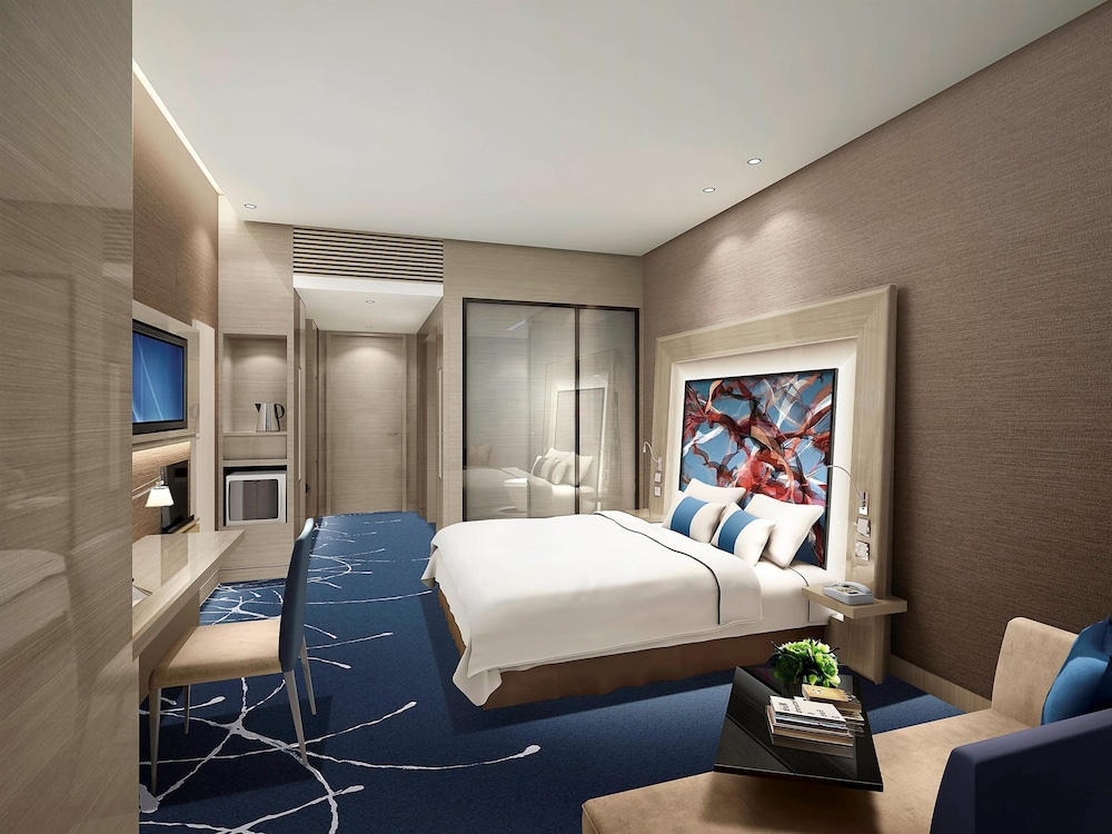 HABITACIÓN SUPERIOR con 1 cama king size del hotel Novotel Ningbo East. Foto 1