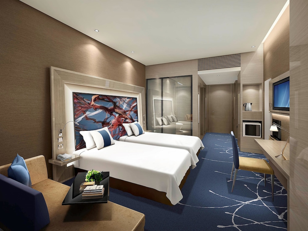 Habitación Premier con 2 camas individuales, Piso Premier del hotel Novotel Ningbo East