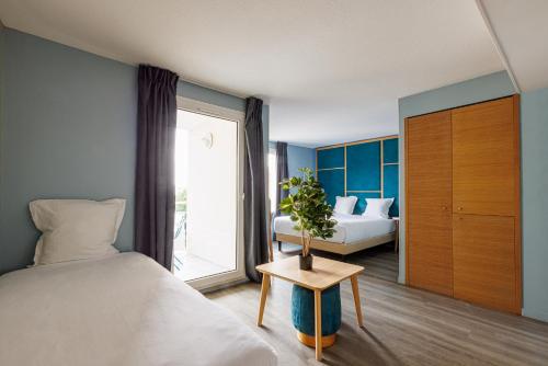 Habitación Triple con balcón del hotel Sanso by HappyCulture. Foto 3