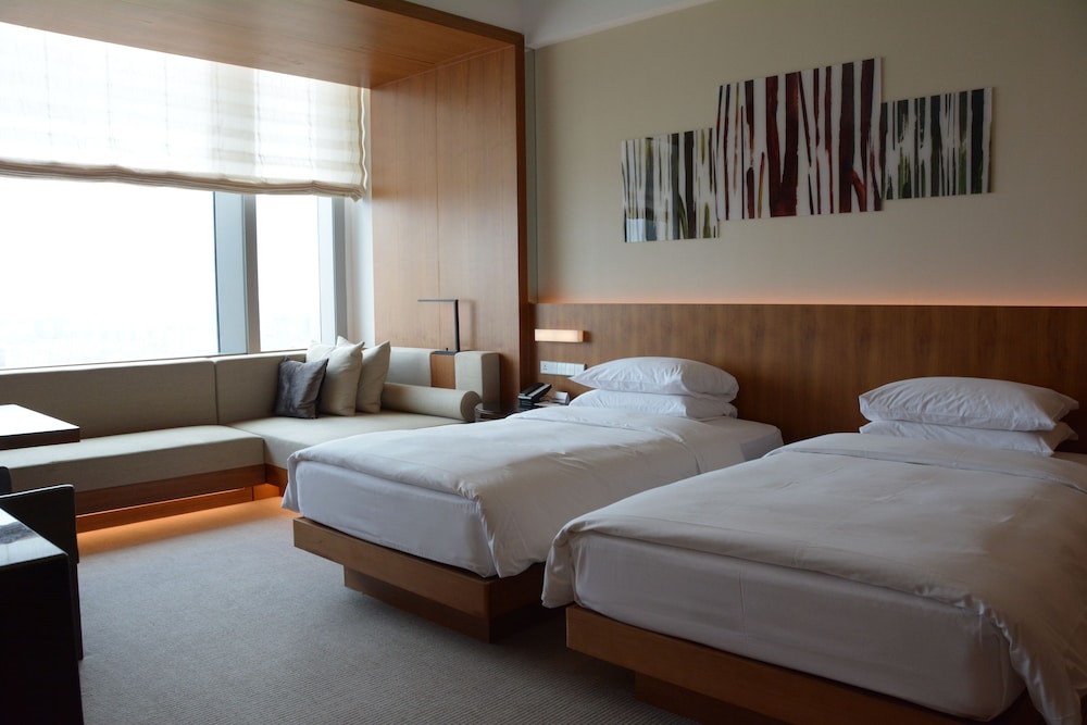 Habitación Deluxe, 2 camas individuales del hotel Hyatt Regency Changchun. Foto 1