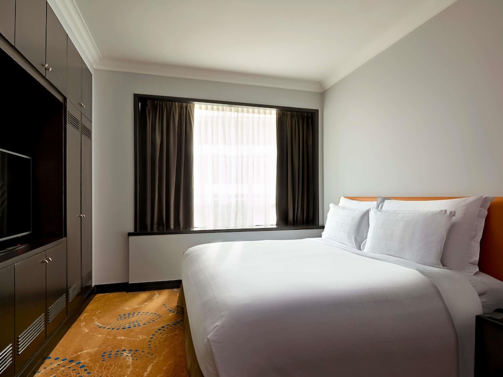 APARTAMENTO DELUXE DE 1 DORMITORIO, 1 CAMA KING SIZE del hotel Pullman Kuala Lumpur City Centre and Residences. Foto 2