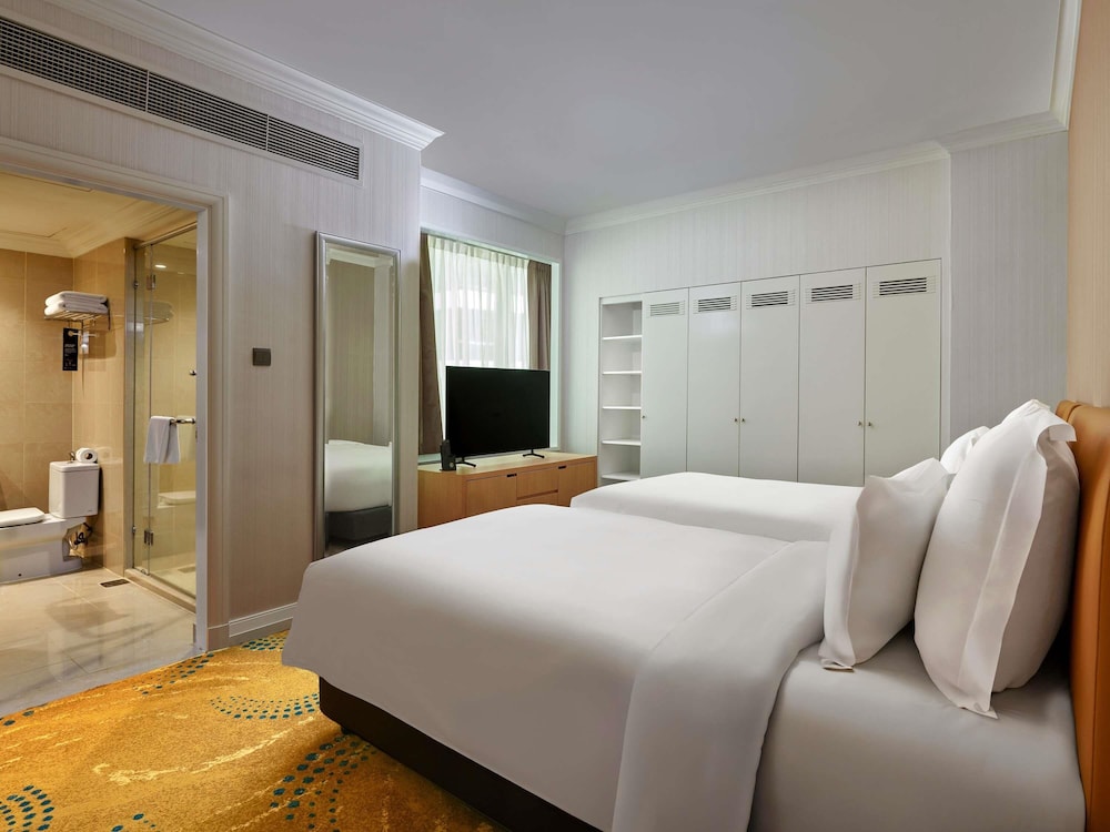 APARTAMENTO DE 2 DORMITORIOS, 1 CAMA KING SIZE, 2 CAMAS INDIVIDUALES del hotel Pullman Kuala Lumpur City Centre and Residences. Foto 7