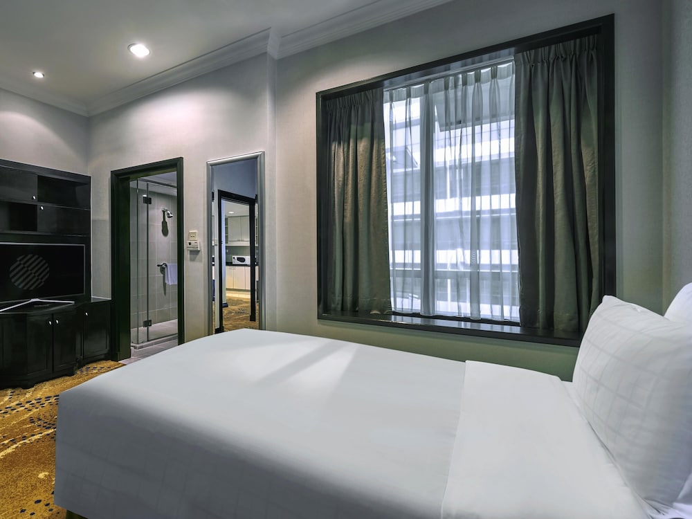 APARTAMENTO DE 3 DORMITORIOS, 2 CAMAS KING SIZE, 2 CAMAS INDIVIDUALES del hotel Pullman Kuala Lumpur City Centre and Residences. Foto 2