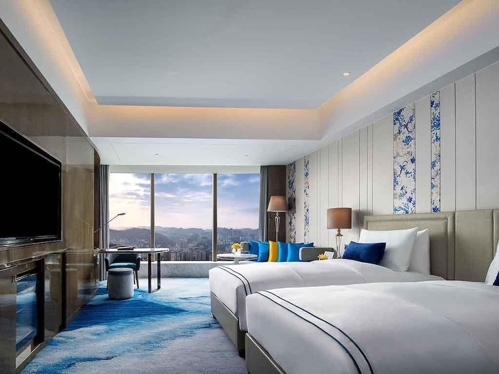 HABITACIÓN DE LUJO CLUB SOFITEL, Club Millésime, 2 Camas Individuales del hotel Sofitel Guiyang Hunter. Foto 1
