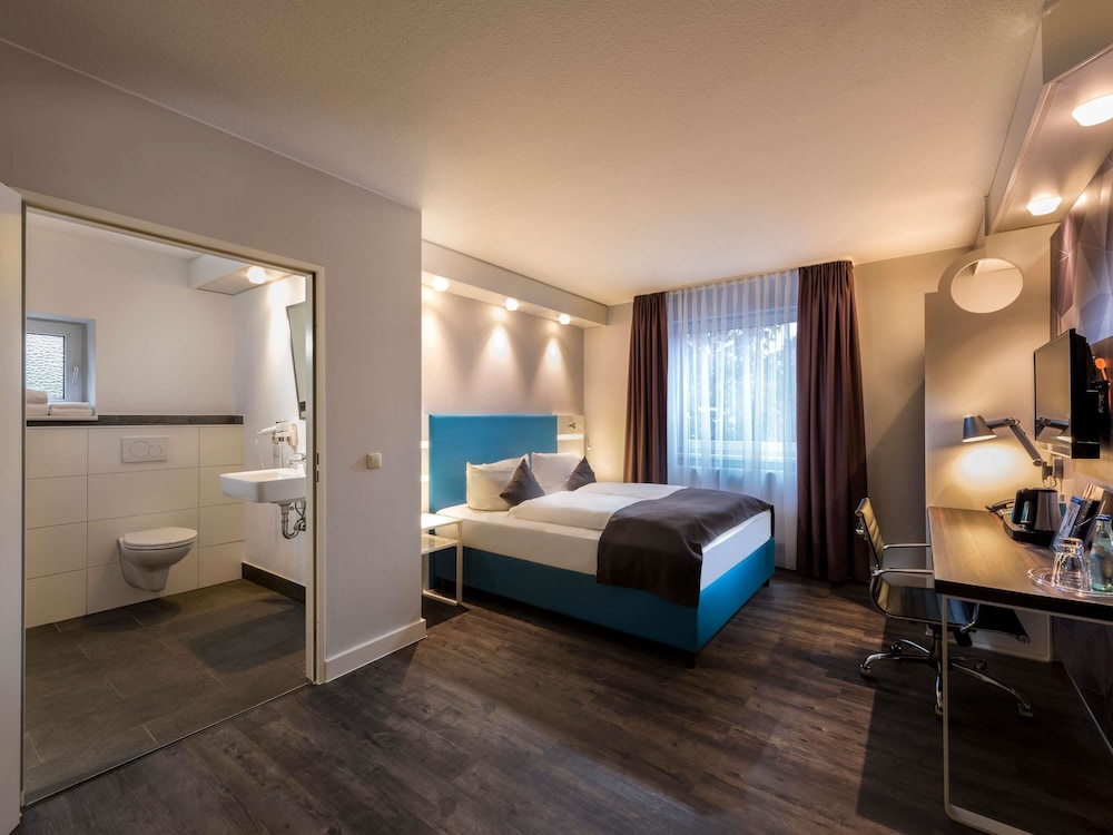 Habitación Estándar Accesible con 1 cama doble del hotel Ibis Styles Cologne Airport. Foto 5