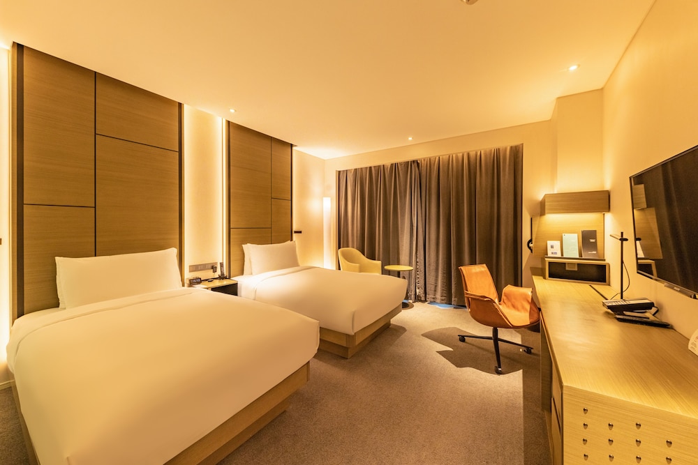 Habitación Innside con vistas a la ciudad del hotel Innside Zhengzhou. Foto 3