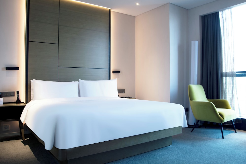 Habitación Innside con vistas a la ciudad del hotel Innside Zhengzhou. Foto 4