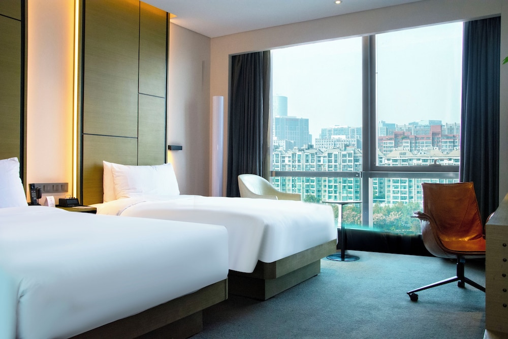 Habitación Innside con vistas al río del hotel Innside Zhengzhou. Foto 8