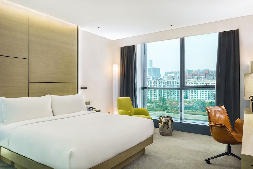 Estudio con vistas a la ciudad del hotel Innside Zhengzhou. Foto 11