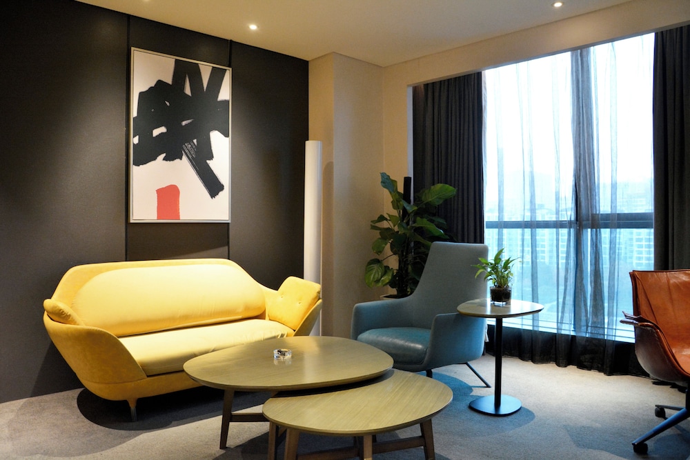 Loft con vistas a la ciudad del hotel Innside Zhengzhou. Foto 6