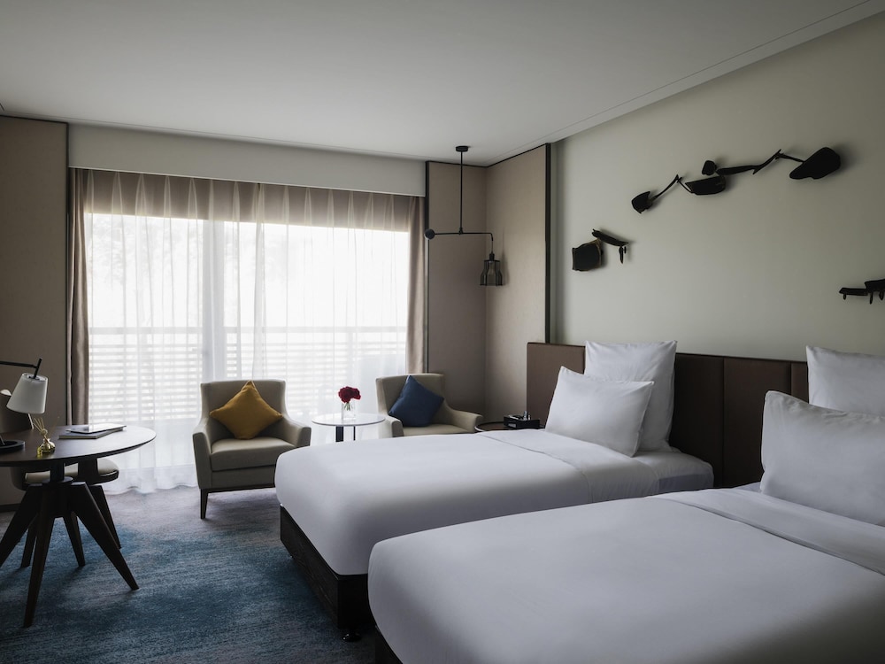 HABITACIÓN DELUXE EJECUTIVA, BENEFICIOS DEL SALÓN, DOS CAMAS INDIVIDUALES, VISTAS AL PARQUE del hotel Pullman Zhouzhuang. Foto 2