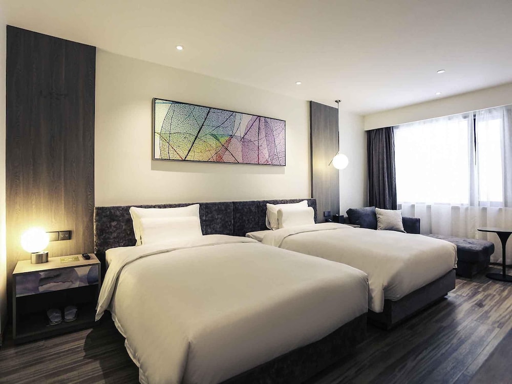 Habitación superior con 2 camas individuales del hotel Mercure Shanghai Hongqiao South
