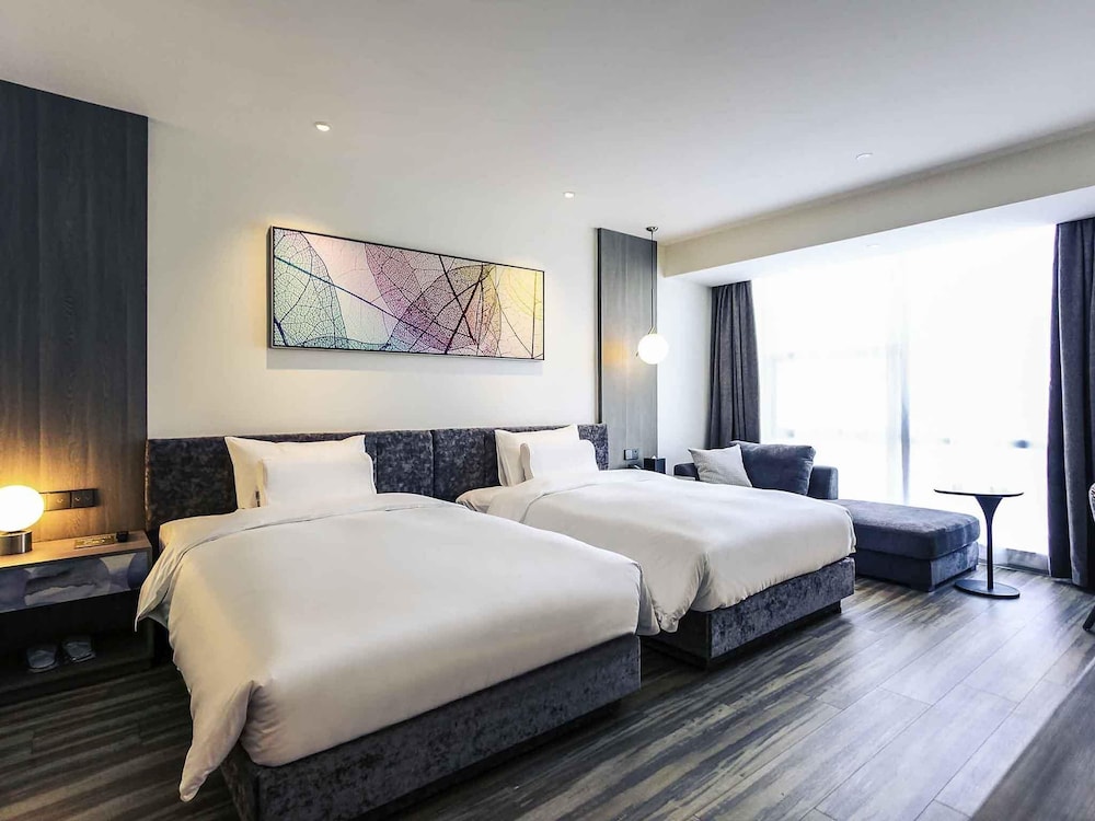 Habitación Deluxe con 2 camas individuales del hotel Mercure Shanghai Hongqiao South