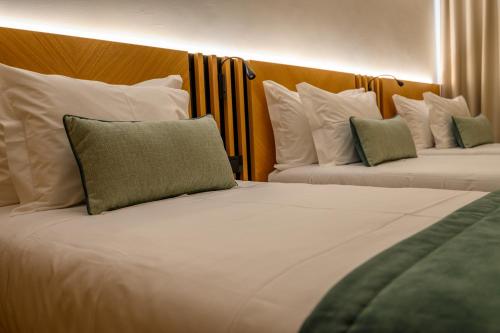 Habitación Triple Clásica del hotel Santa Eufémia Covilhã. Foto 3
