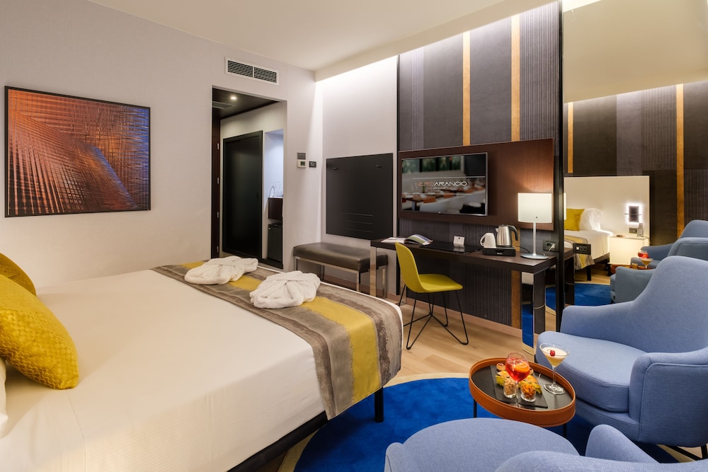 Habitación Deluxe con 1 cama doble o 2 individuales del hotel Savhotel. Foto 1