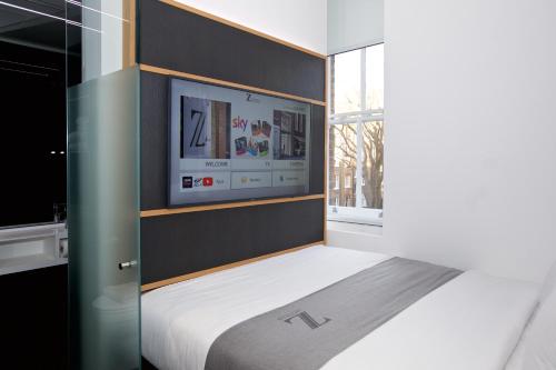 Habitación con cama grande del hotel Z Hotel Covent Garden. Foto 4
