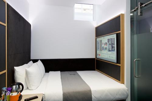 Habitación adaptada para personas con movilidad reducida - Cama grande del hotel Z Hotel Covent Garden. Foto 1
