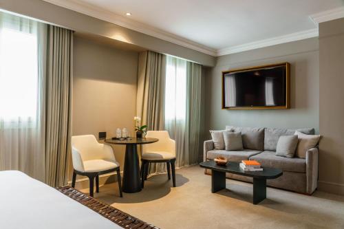 Junior suite 1 Cama king Vista ciudad Normal del hotel Casa Lucia Member of Melia Collection. Foto 1