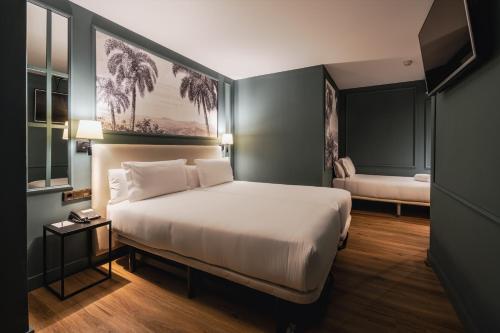 Habitación Triple Deluxe del hotel Luze Castellana. Foto 2