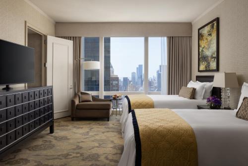 Habitación Twin con vistas al Hudson - 2 camas individuales y ducha a ras de suelo del hotel The Mandarin Oriental. Foto 3