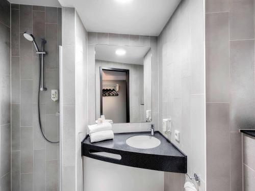 Habitación estándar con 2 camas individuales del hotel Ibis Budget Luebeck City Sued. Foto 3