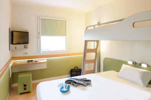 Habitación Doble Estándar del hotel Ibis Budget Nuernberg City Messe. Foto 9