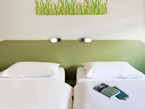 Habitación Doble Estándar - 2 camas del hotel Ibis Budget Nuernberg City Messe. Foto 2