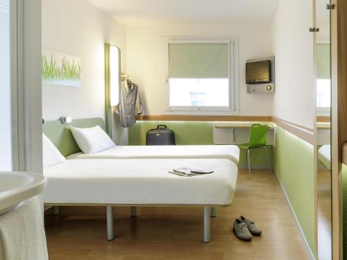 Habitación Doble Estándar - 2 camas del hotel Ibis Budget Nuernberg City Messe. Foto 4