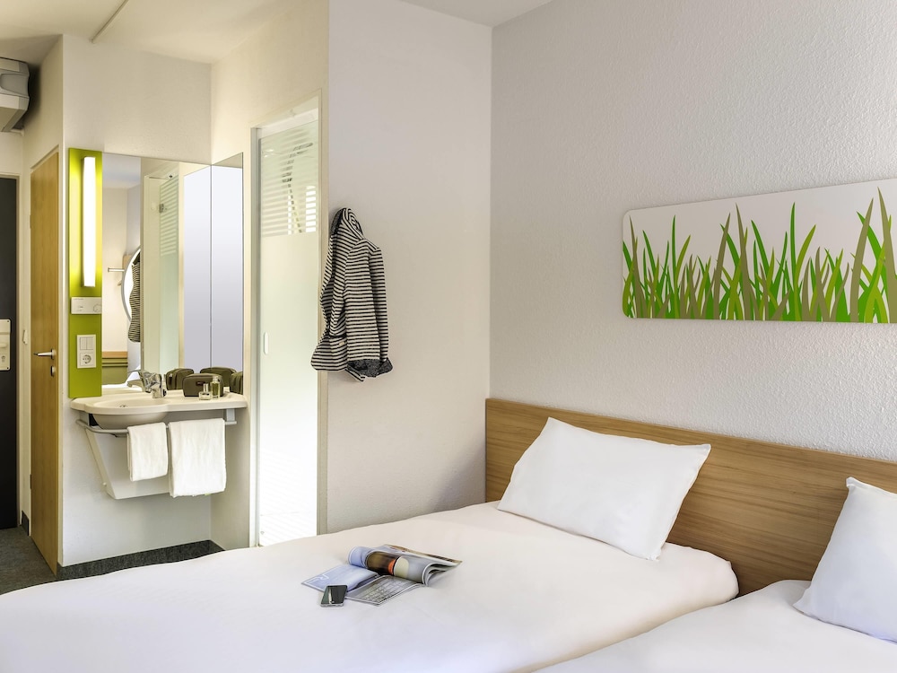 Habitación estándar con 2 camas individuales del hotel Ibis Budget Muenchen Airport Erding. Foto 4