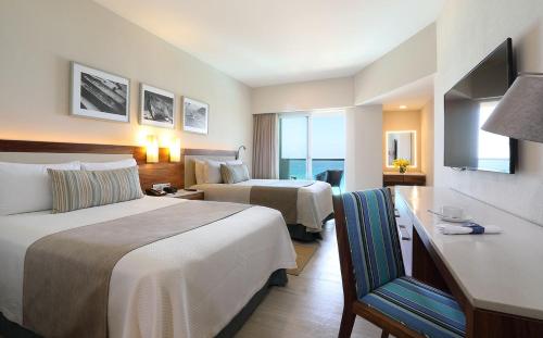 Habitación Doble Deluxe frente al mar del hotel Emporio Cancun