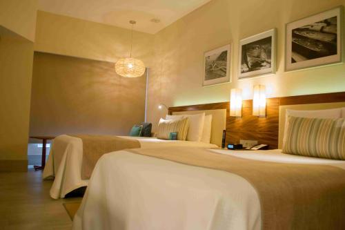Habitación Doble Deluxe del hotel Emporio Cancun. Foto 4