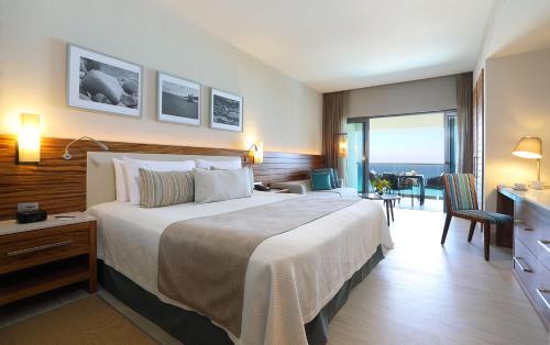 Habitación con cama extragrande y acceso directo a la piscina - Frente al mar - Solo adultos del hotel Emporio Cancun
