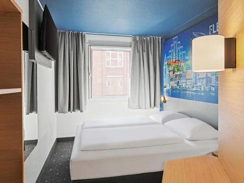Habitación Estandar del hotel Ibis Budget Flensburg City. Foto 1