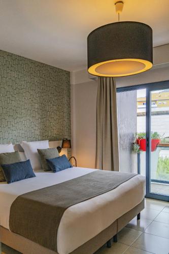 Habitación Doble con balcón - 2 camas del hotel Benahoare. Foto 1