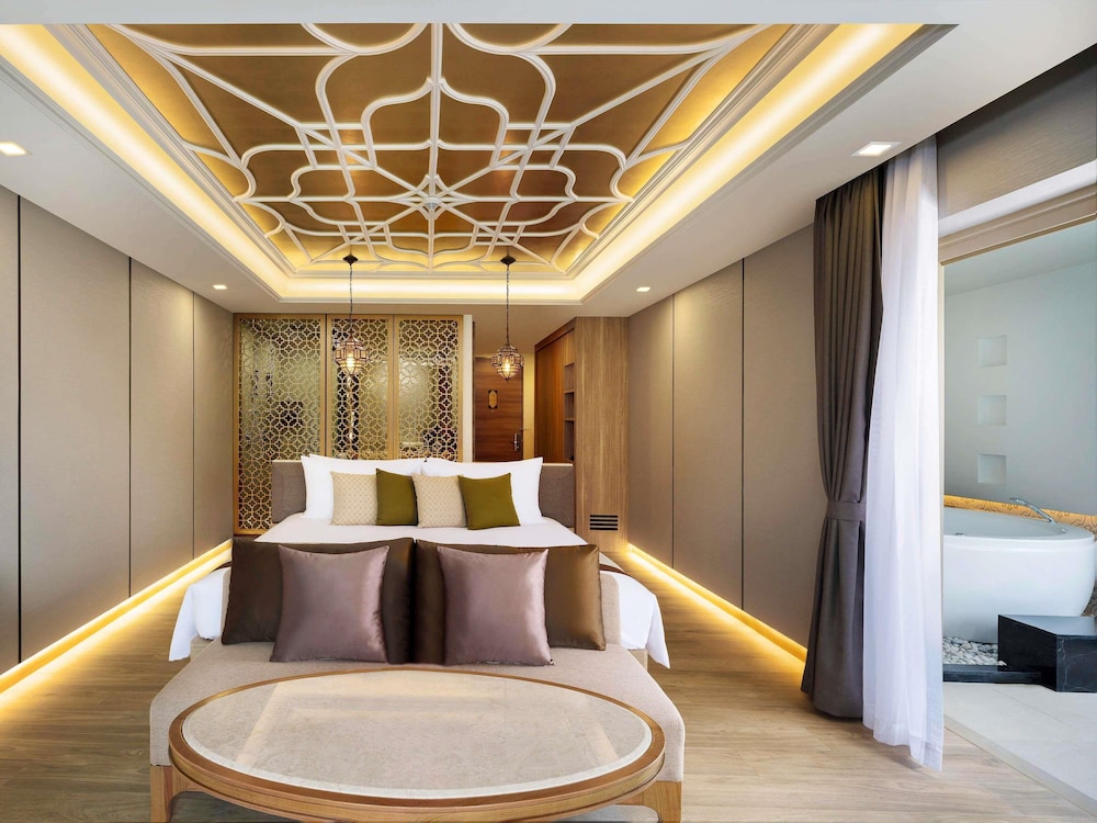 SUITE DELUXE CON BAÑERA DE HIDROMASAJE, VISTAS AL MAR, 1 CAMA KING del hotel Avista Grande Phuket Karon - Mgallery. Foto 8