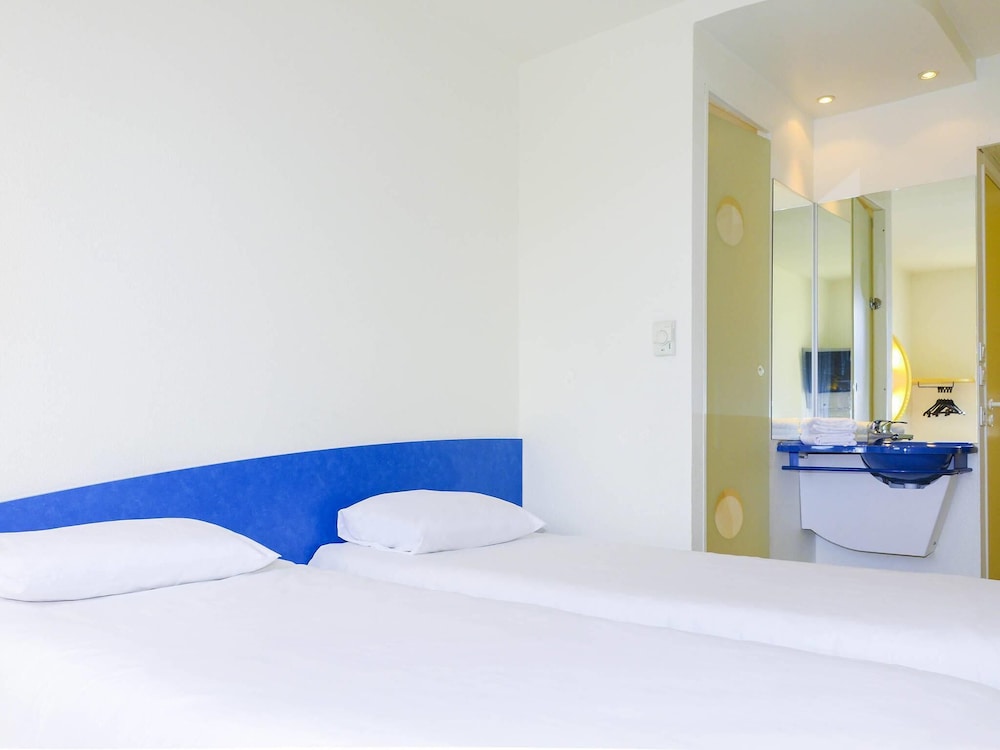 TWIN - Habitación con dos camas individuales del hotel Ibis Budget Nevers Varennes Vauzelles
