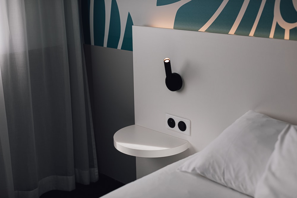 Habitación estándar con 2 camas individuales del hotel Ibis Styles Nancy West Laxou. Foto 3