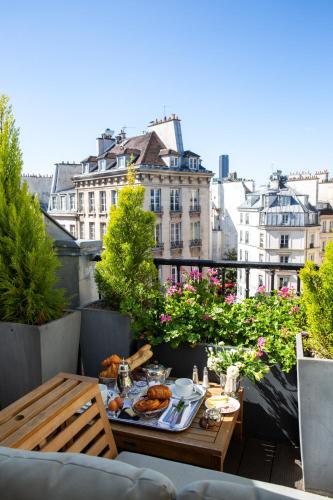 Suite con terraza del hotel Hôtel Le Relais Saint-germain. Foto 3