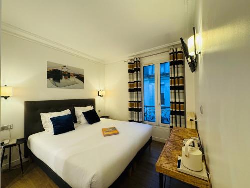 Habitación Triple del hotel L'amiral. Foto 3