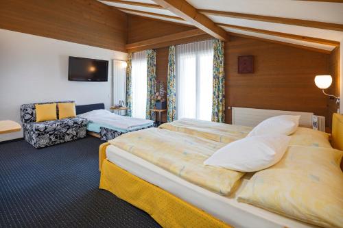 Habitación Cuádruple Estándar del hotel Stella Swiss Quality. Foto 1