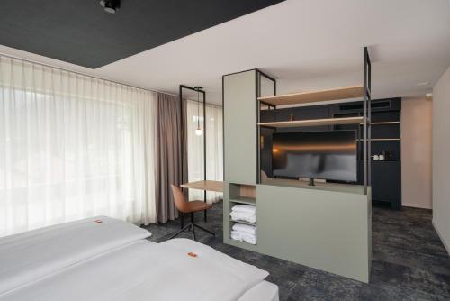 Habitación Doble con Terraza del hotel Stella Swiss Quality. Foto 4
