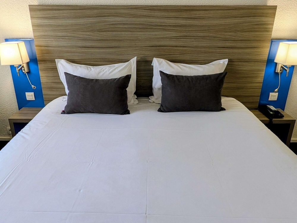 Habitación Standard con una cama doble del hotel Ibis Styles Grenoble Centre Gare. Foto 9